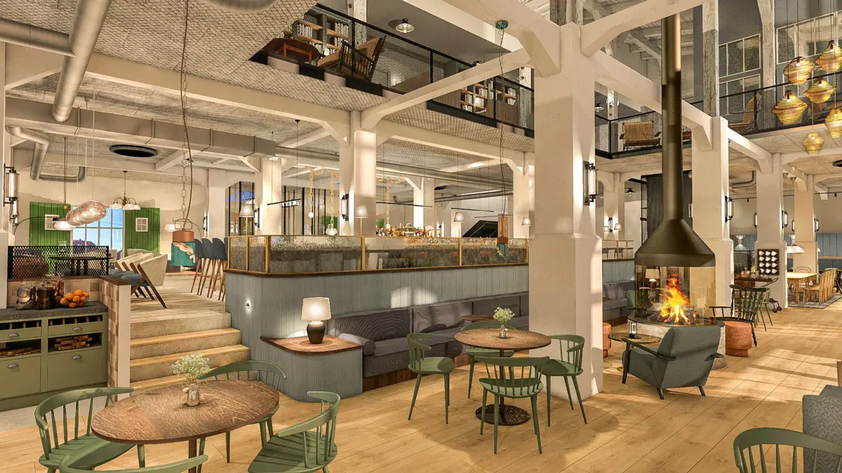 HENRI Hotel Cuxhaven Hausküche Ein Raum mit Tischen und Stühlen.