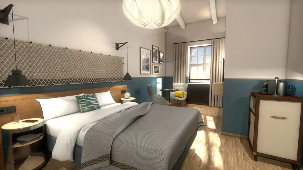 Hotelzimmer im HENRI Cuxhaven Schlafzimmer mit einem Bett und einem Stuhl.