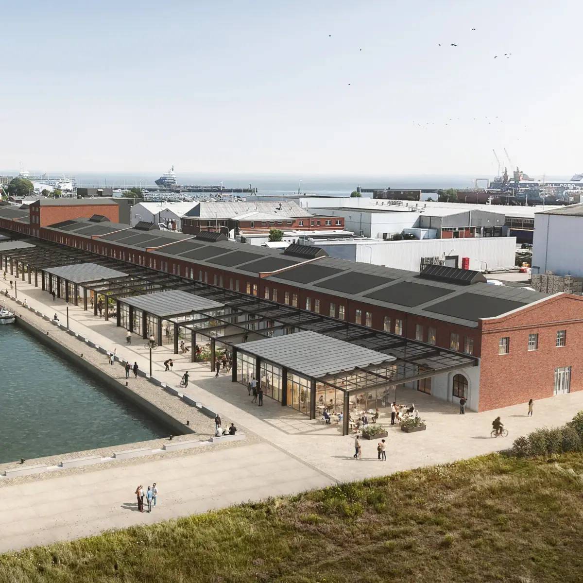 Alter Fischereihafen in Cuxhaven Ein Dock mit einer Reihe von Gebäuden und einem Gewässer.