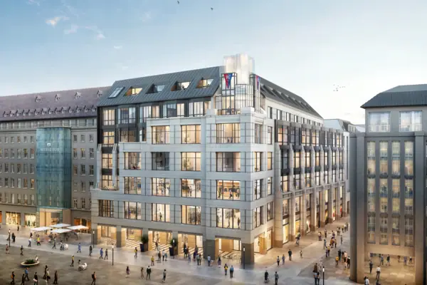 HENRI Hotel Leipzig Außenansicht Eine Gruppe von Menschen geht um das zukünftige HENRI Hotel in Leipzig herum.