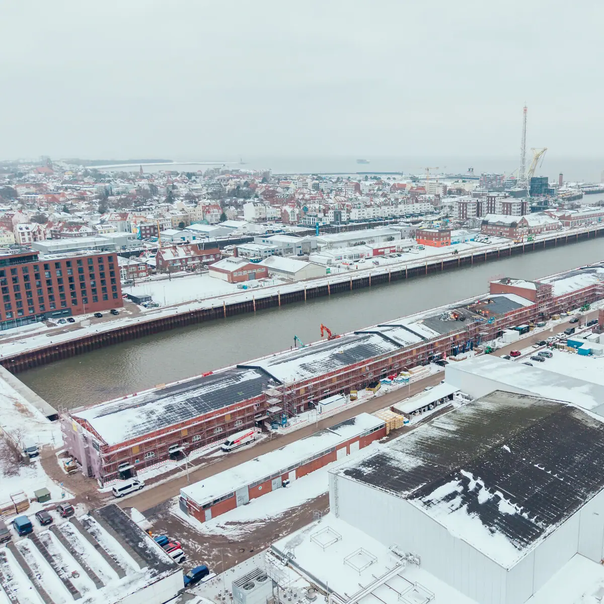Fischereihafen Cuxhaven Luftaufnahme Eine Luftaufnahme des Fischereihafens in Cuxhaven im Winter bei Schnee.