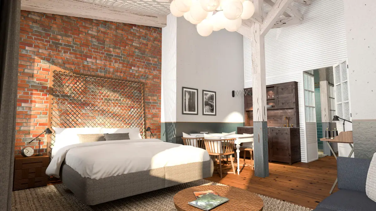 Hotelzimmer im HENRI Cuxhaven Innenansicht eines Hotelzimmers im HENRI Hotel Cuxhaven mit einem Bett, Tisch und Stühlen.